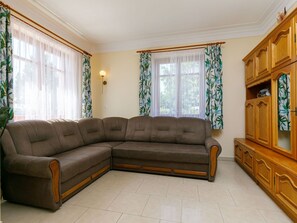 Furniture, Property, Couch, Wood, Living Room, Interior Design, Floor, Flooring, Rectangle, Shade