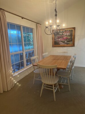 The dining room is a little bit formal, a little bit country, a lot of charm. 