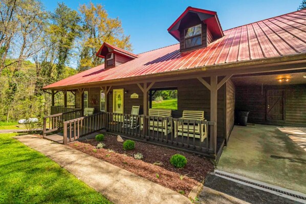 Covered carport area for additional outdoor space to enjoy