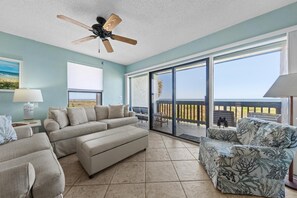 Lounge in the living area with the ocean next to you