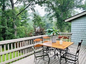 Enjoy sitting in the “treetops” on the back porch 