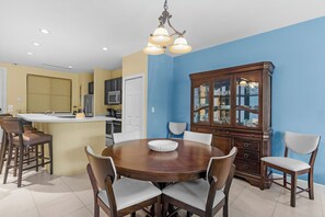 The condo features beautiful wood furniture including a dining table that seats up to 6 guests.  