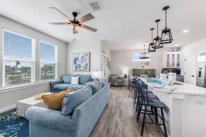 Conjoined kitchen, dining, and living area