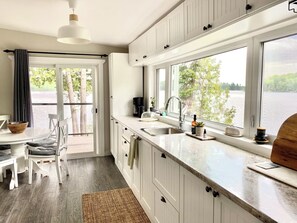 Water's Edge cottage kitchen with beautiful lake view