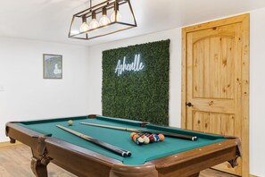 Lower Level Living Area w/ Pool Table & Workout Space