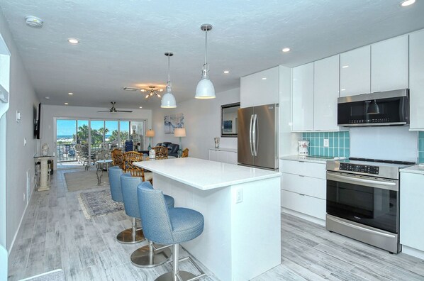 Kitchen Area - Look through - new flooring throughout