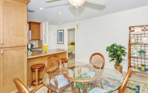 Dining Area - Seating for for and extra seating at the breakfast bar.