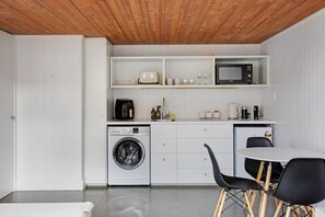 The kitchenette has a microwave, air fryer, toaster and mini fridge.