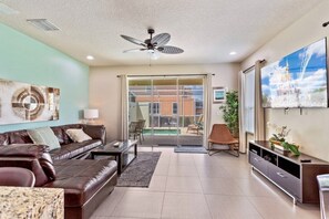 Spacious and modern living area with natural light and outdoor access.
