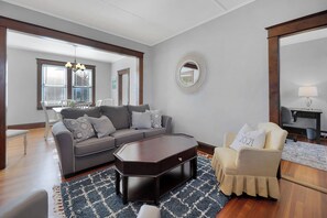 View into dining room and den/home office.