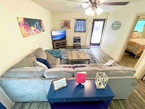 View into living room from office area