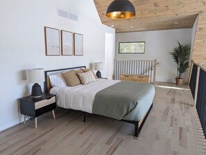 Master bedroom featuring a plush queen size bed