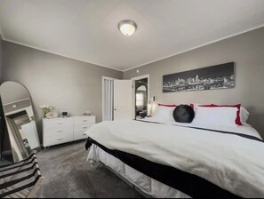 This bedroom has a king-sized Tempur-Pedic Mattress