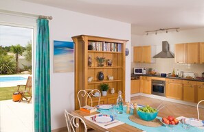 Settle into the dining area and enjoy a nice meal.