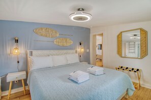 King guest bedroom with cool coastal colors.