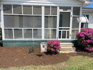 enjoy mornings or evenings on the screened in porch 