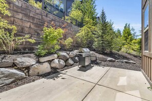 Exterior: View of private patio, gas grill