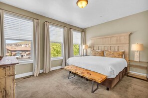 Bedroom 1: Master suite, king bed, 60” TV, en-suite bath, main floor