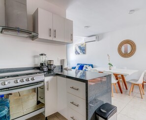 A fully-equipped kitchen for preparing meals at home