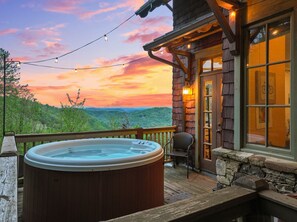 Escape to our hot tub oasis with stunning mountain and sunset vistas