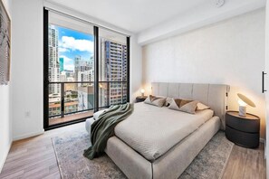 Unit with 1 King bed in main bedroom and 1 Queen bed in second bedroom. The exact unit will be assigned upon arrival. Views, colors and décor may vary.