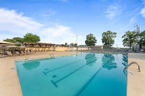 Dive into relaxation at the main outdoor pool at Pointe Royale resort.