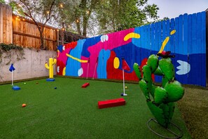 Perfect your putt or simply relax in our expansive backyard, complete with its own Putt-Putt Mini Golf course! It’s your private playground for fun, laughter, and creating unforgettable memories under the open sky.