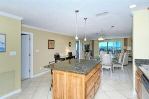 Kitchen - Large island with granite countertop.