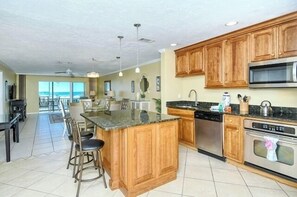 Kitchen Area - Open concept with extra seating at island.