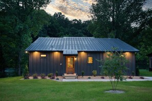 Custom-built in 2024, this modern chalet blends upscale finishes with the natural beauty of East Tennessee.