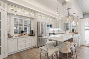 Kitchen with large pantry and island