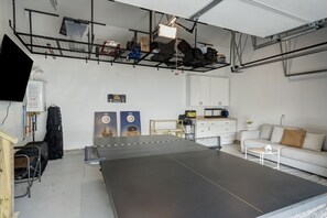 Game Time! Kick back in the garage and watch your guests battle it out on the ping pong table.