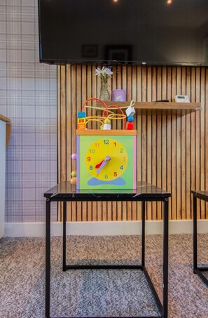 Living room - children toy - we have plenty of toys for the little ones. Let them wonder behind the armchair, we have a bag full of toys ;-)