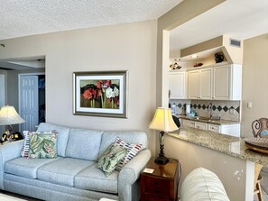 The living room has a sleeper sofa!