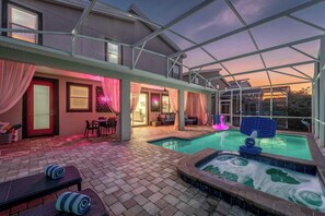 A true backyard oasis after the parks. Pool area normally will have safety fencing (not pictured) for your stay.