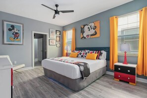 Art showcase and custom furniture details bring Disney magic to grown-up decor.