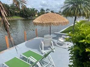 Outside dock on Canal to tie up your boat or relax in the sun. Fishing poles are available to use as well.