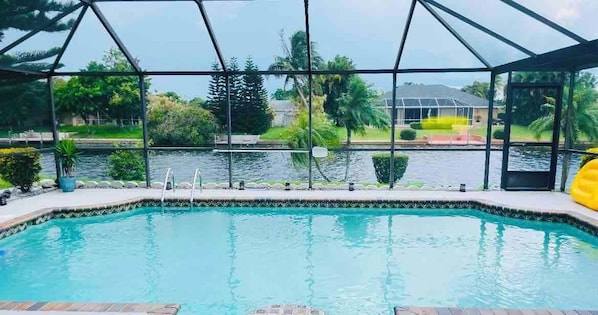 Extra large and deep heated pool with privacy on all sides.