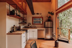 A view of the kitchen from living room