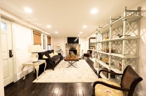 Gather with family and friends in this expansive dining room, designed for comfort and memorable meals.