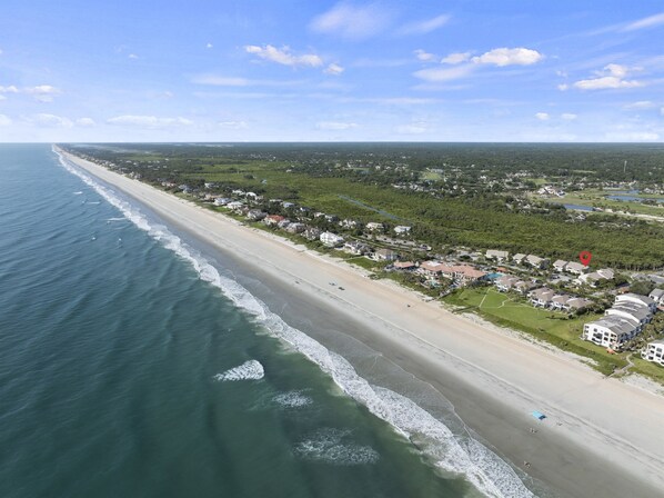 Feel the ocean breeze and walk to the sand in seconds, your beach escape starts right here.
