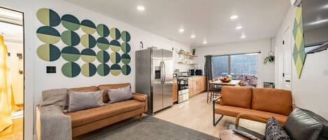Welcome to our open living room/dining room.
