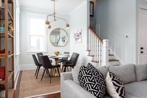Elegant dining space with natural light, ideal for family meals and gatherings.