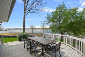 Deck eating options with a lake view for 8.