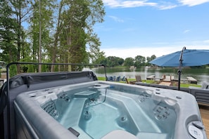 Enjoy the hot tub after a long day on the lake.