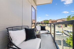 Private outdoor patio with lounge area.