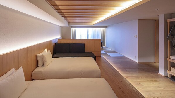 [Premium Suite] 62㎡ / bed width 1,200mm + sofa bed. A room with a warm feel.
