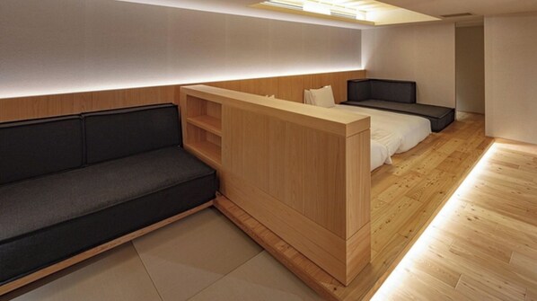 [Grand Twin] 62m² / bed width 1,200mm + sofa bed. A spacious sofa is provided.