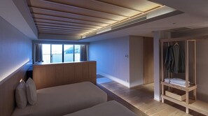 [Premium Twin] 50m² / bed width 1,200mm + sofa bed. Interior made with natural materials.