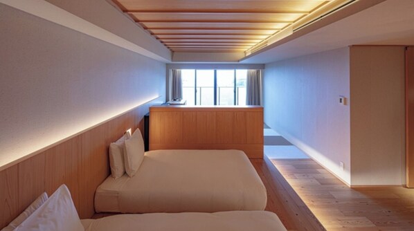 [Premium Twin] 50m² / bed width 1,200mm + sofa bed. Enjoy the ocean view from the terrace.